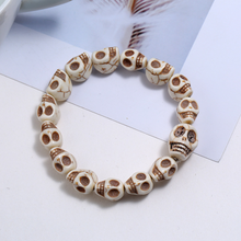 Load image into Gallery viewer, Vintage Skull Style Strand Bracelet